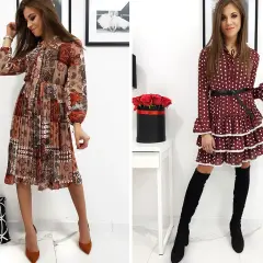 Dwie kobiety w sukienkach. Jedna w sukience w stylu vintage z wzorem paisley i plisowanym dołem, druga w grochy z falbankami.